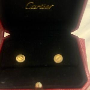 SERIOUS OFFERS NOT $500. Gently used cartier 18k yellow gold love earrings.